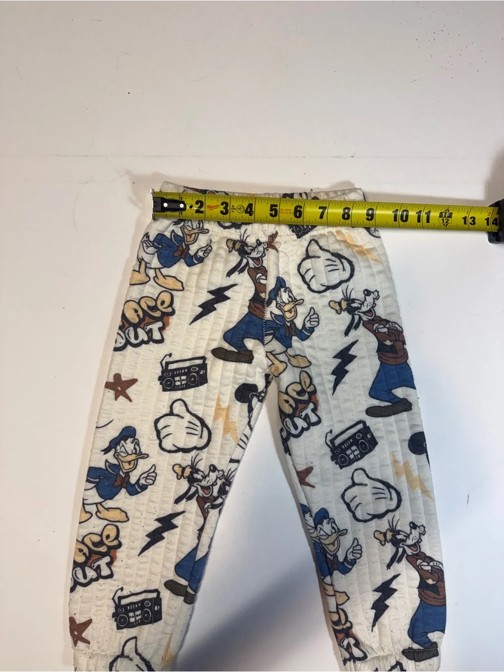 White Cartoon Character Jogger Pants with Blue & Tan Accents